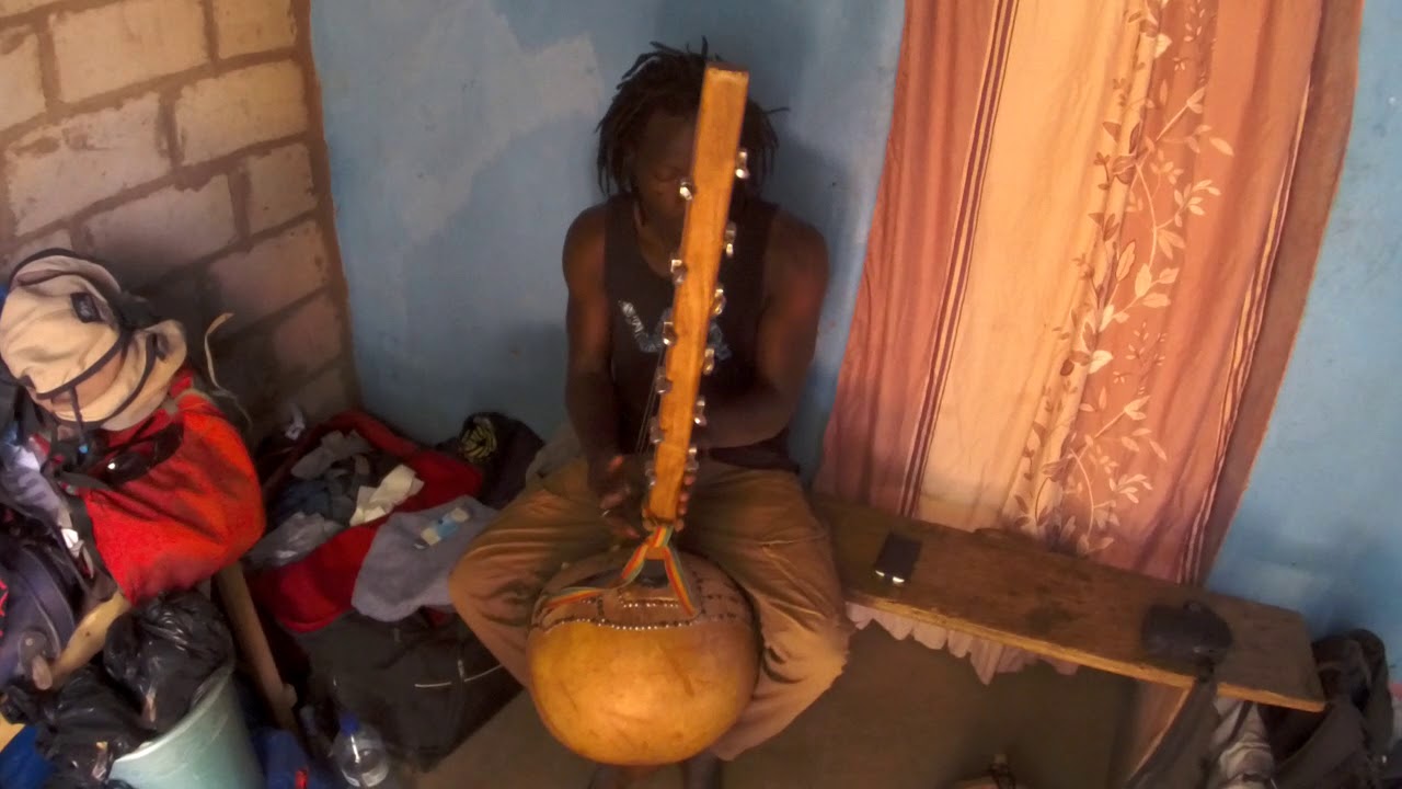 Omar Diallo is playing Kamalengoni (Bobo Dioulasso)