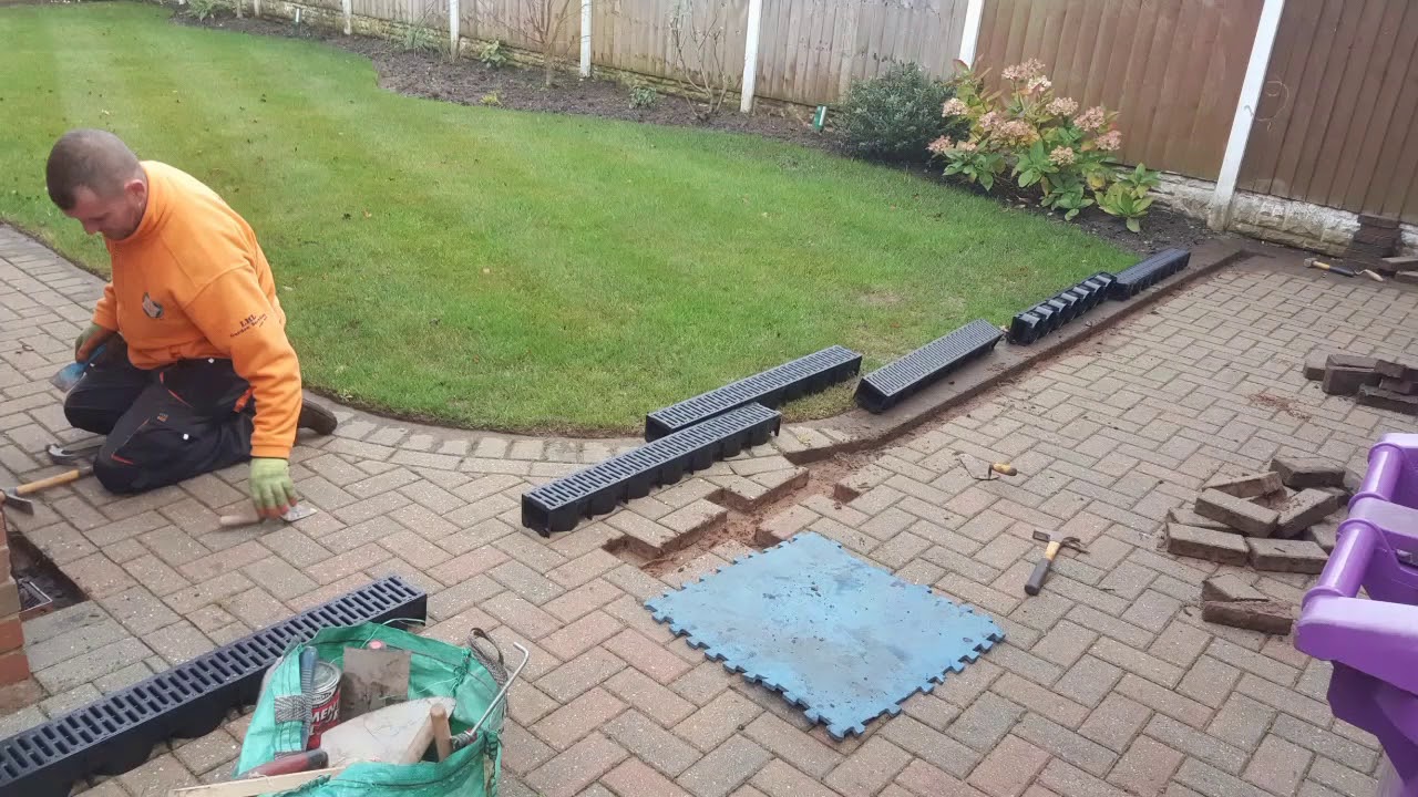 Laying land drains  DRAINAGE PROBLEM SOLVED.