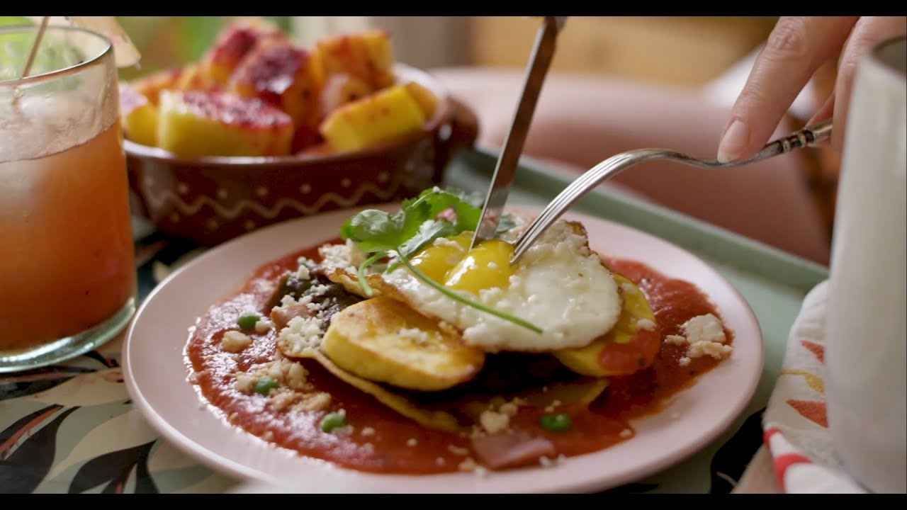 Mexican Inspired Breakfast: Huevos Motuleños aka Eggs on Tortillas with Black Beans and Cheese