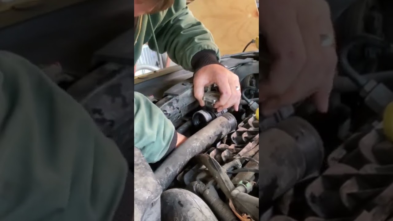 2014 Jeep Compass upper radiator hose repair.