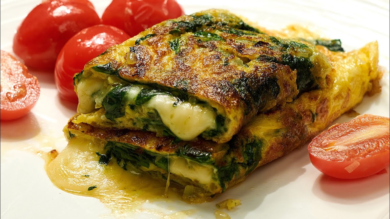 The perfect omelette with spinach. Easy and quick breakfast recipe.