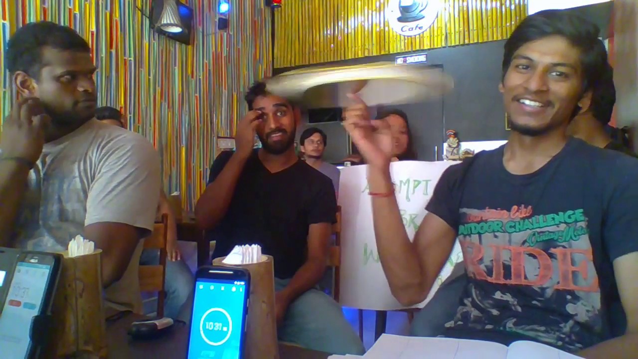 Breaking the Guinness World Records of Spinning book on finger