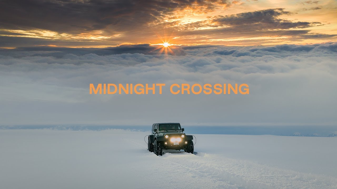 Driving Across a Glacier at Midnight