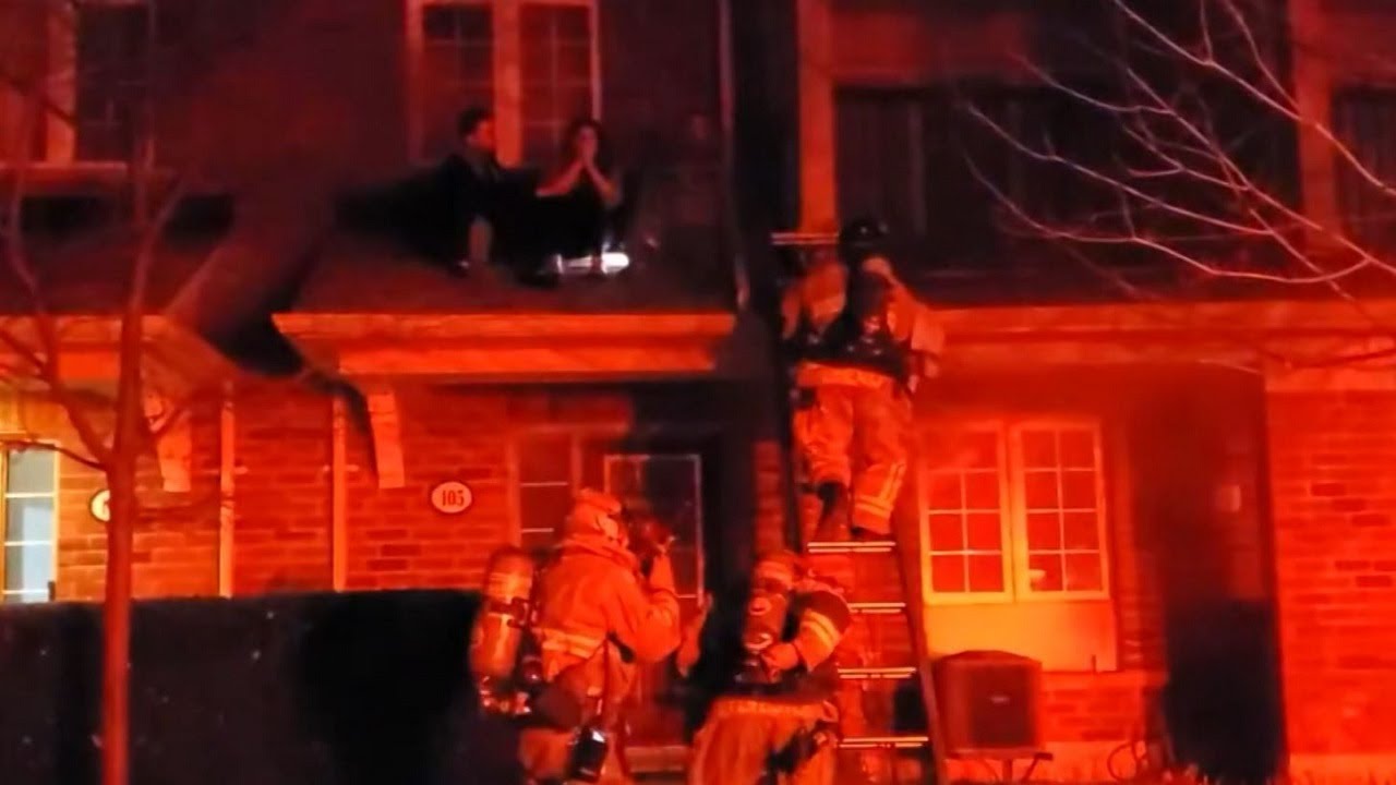 Firefighters save four people from roof of burning Oakville house
