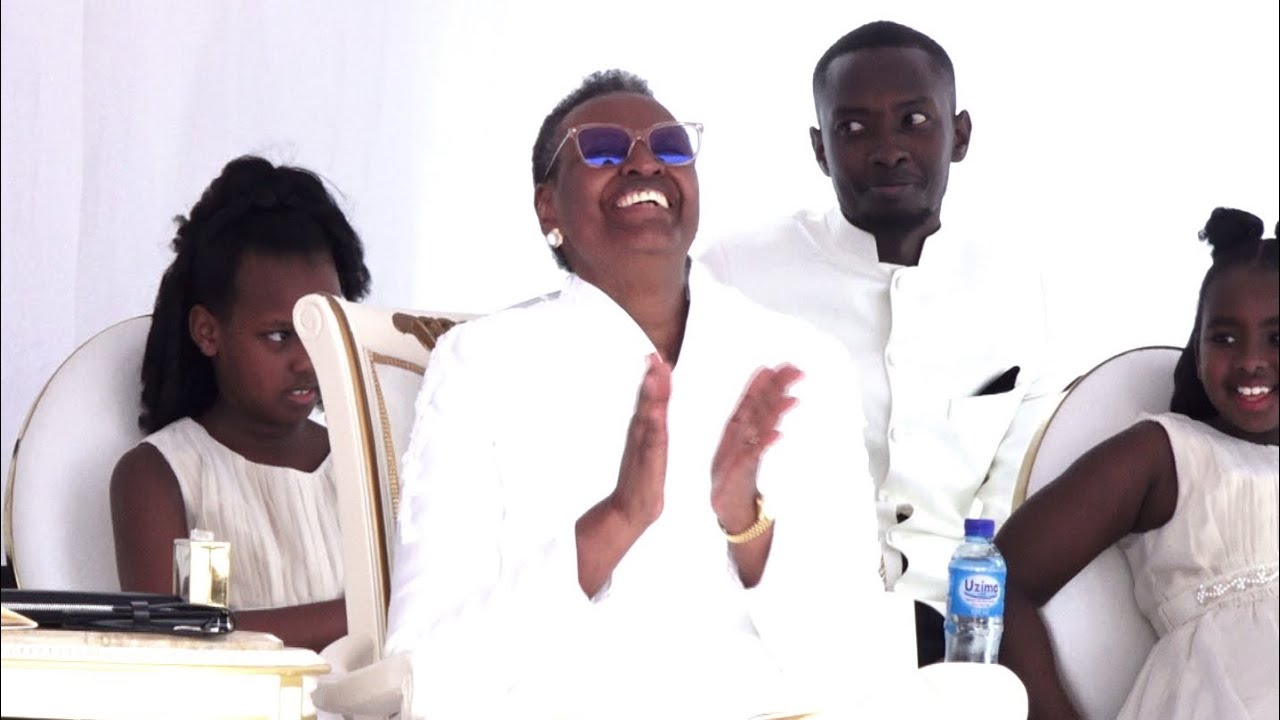First Lady Janet Museveni, grand children burst into laughter after love song by Bishop Ahimbisibwe.