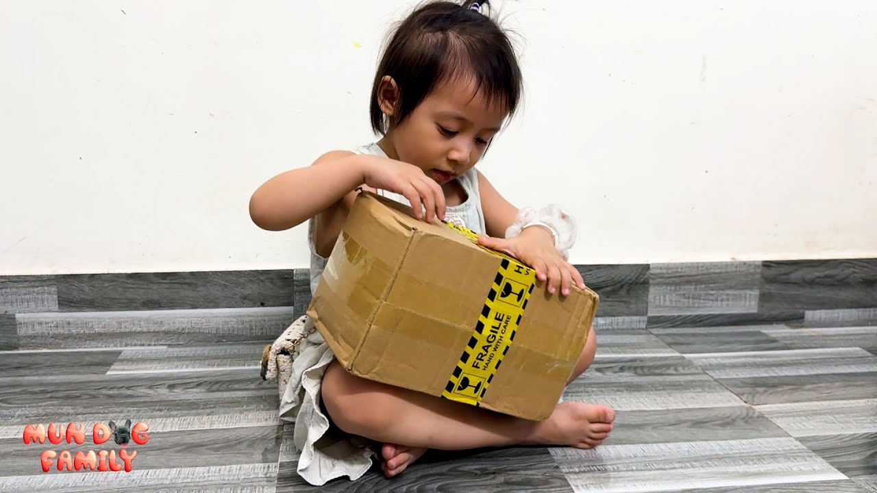Diem was curious about the package her mother bought for the baby