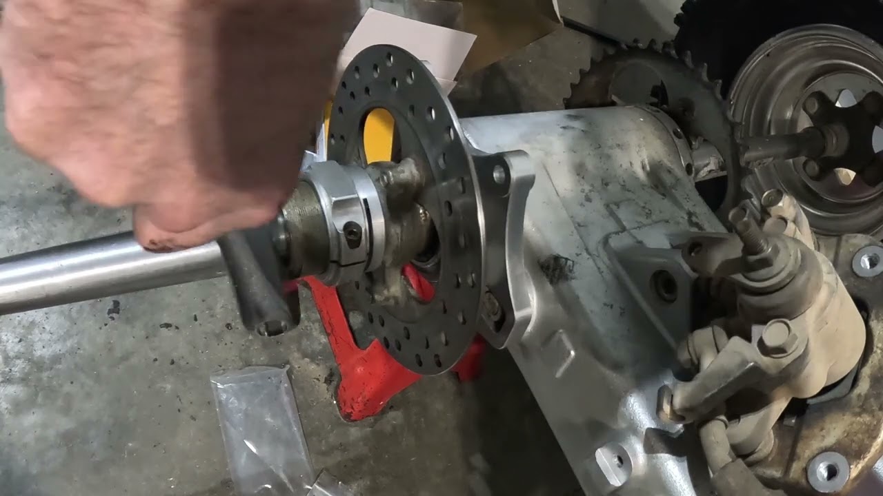 Replacing brake stay on TRX450R.
