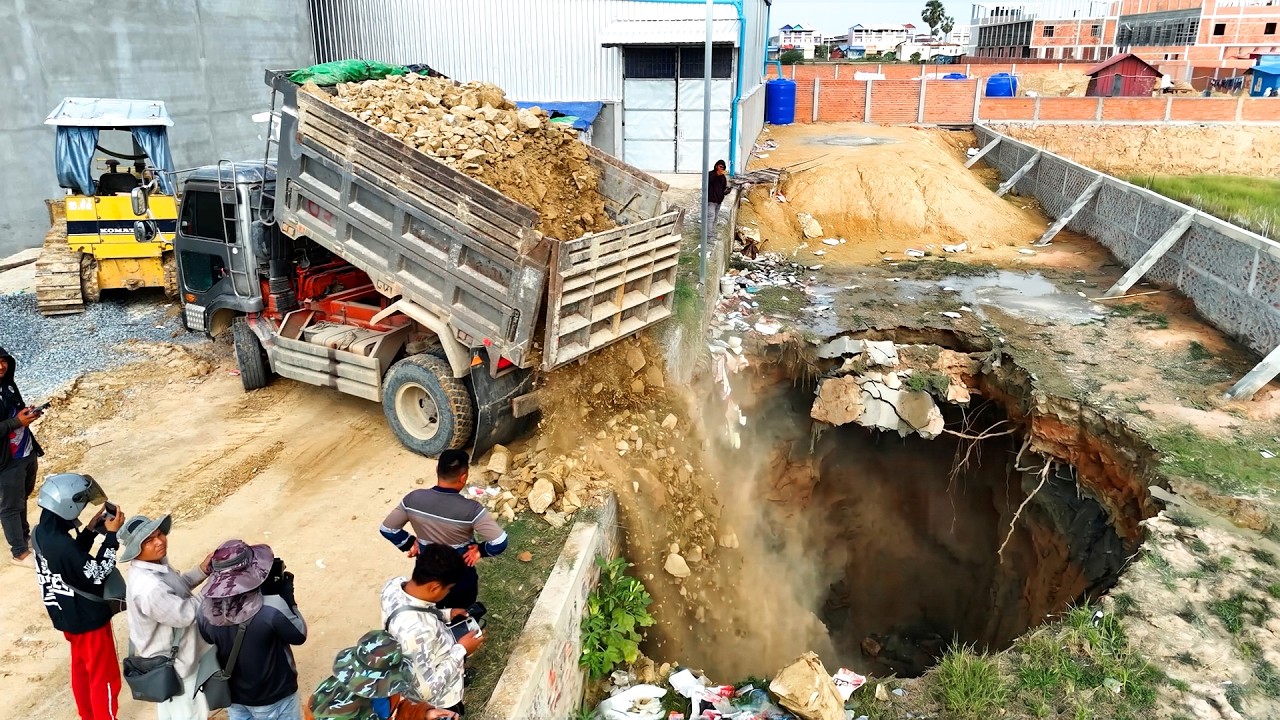 Awesome Landfill Task! Filling by D31P Dozer Push Stone with 5T Dump Truck