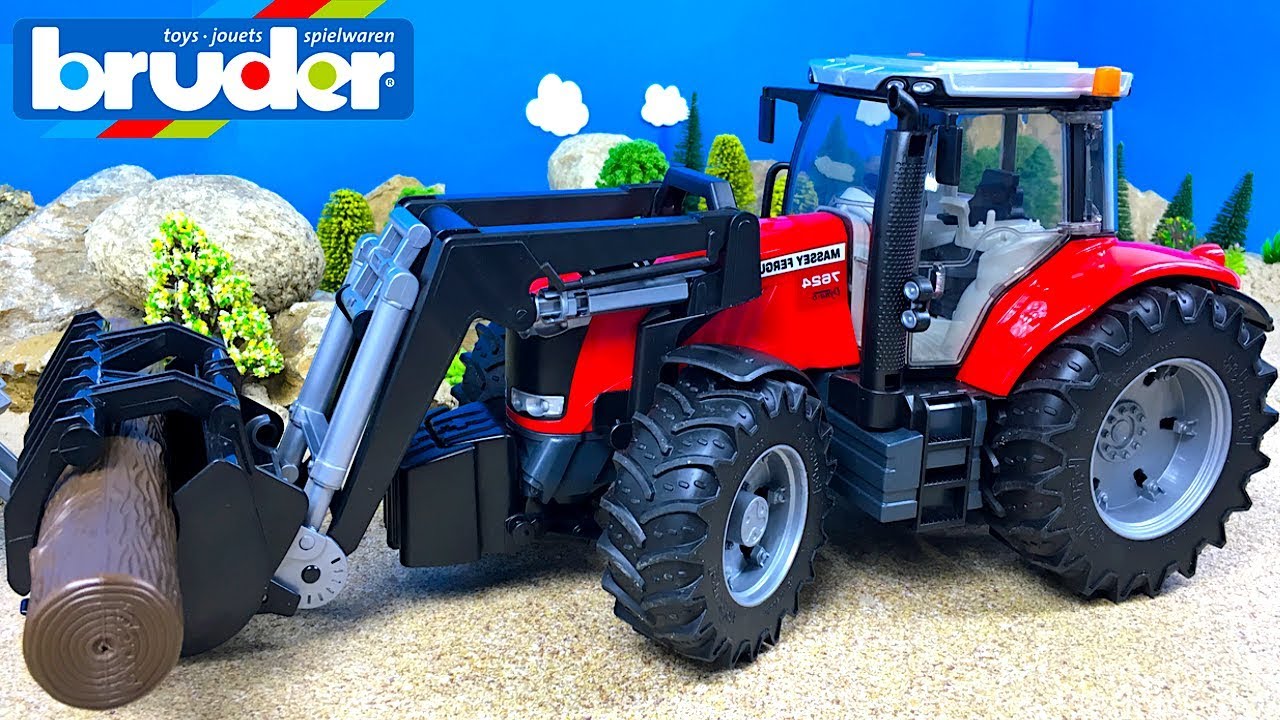 MAQUINAS DE BRUDER CON REMOLQUE PARA TRONCOS - TRACTOR MASSEY FERGUSON