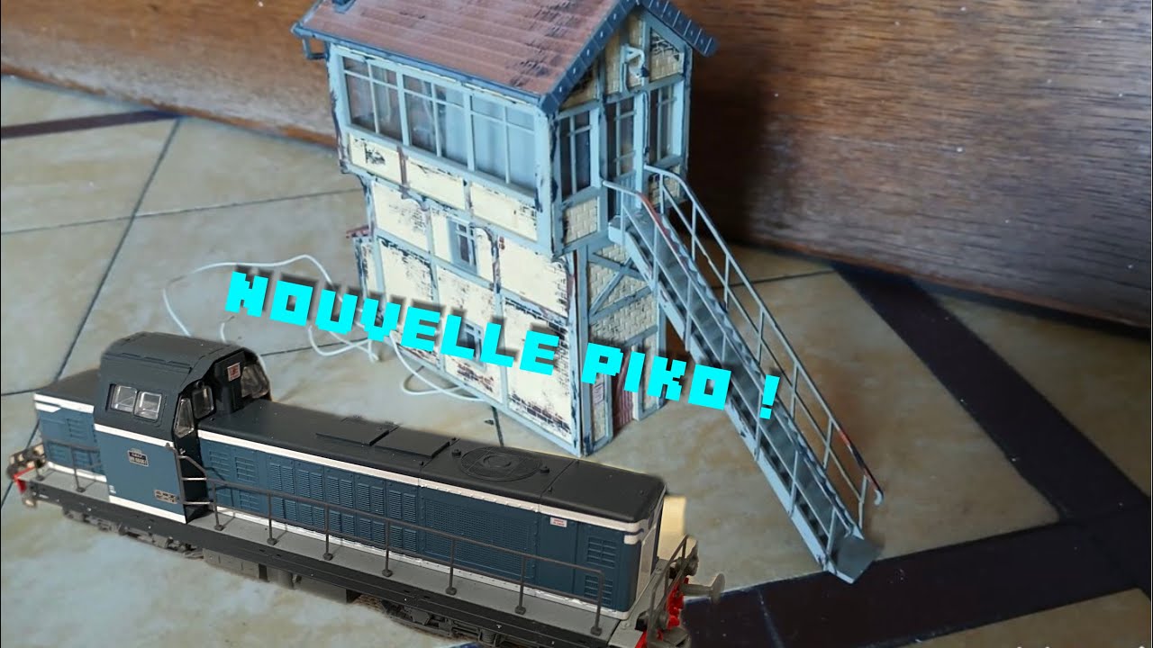 un chouette poste d’aiguillage et nouvelle loco diesel Piko .