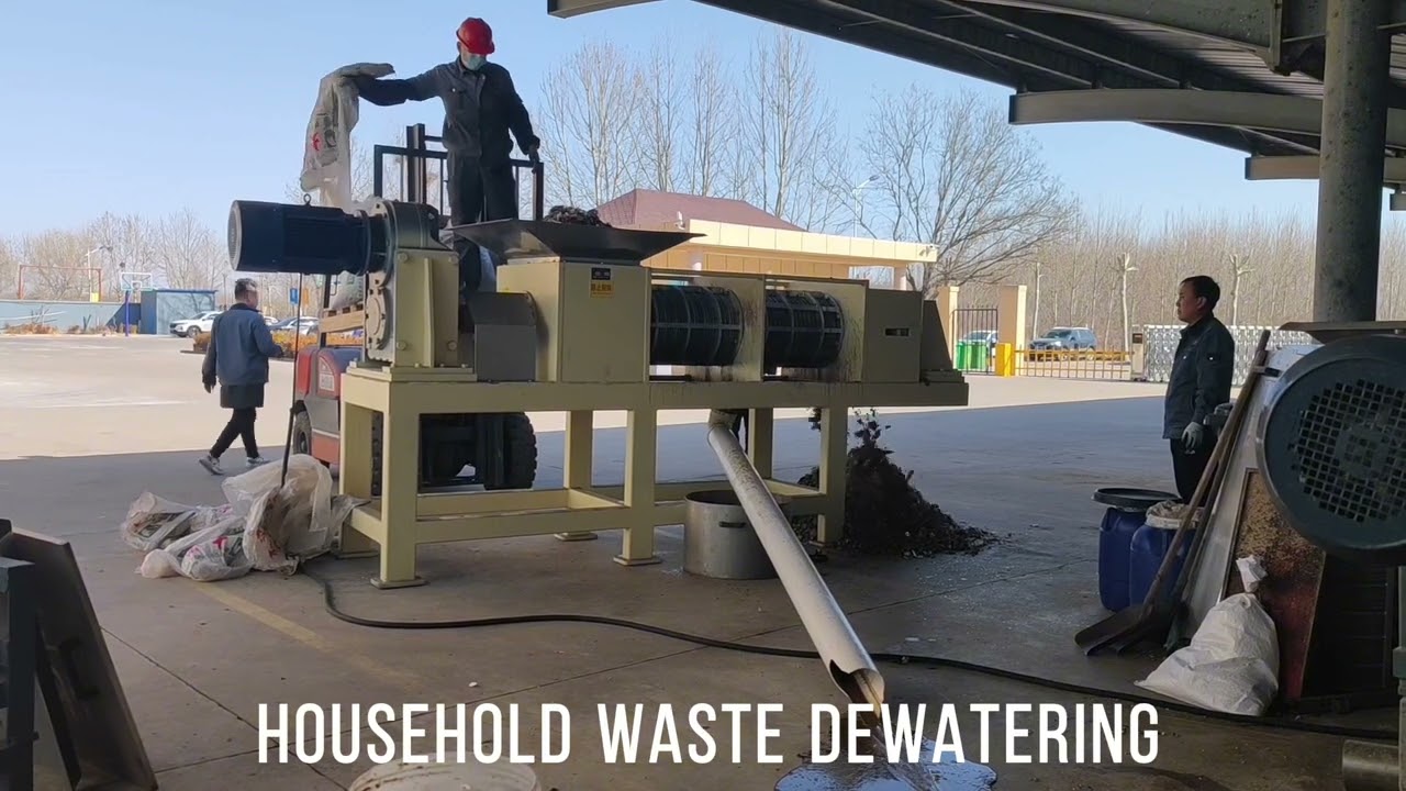 Household waste is dehydrated in a screw press dewatering machine