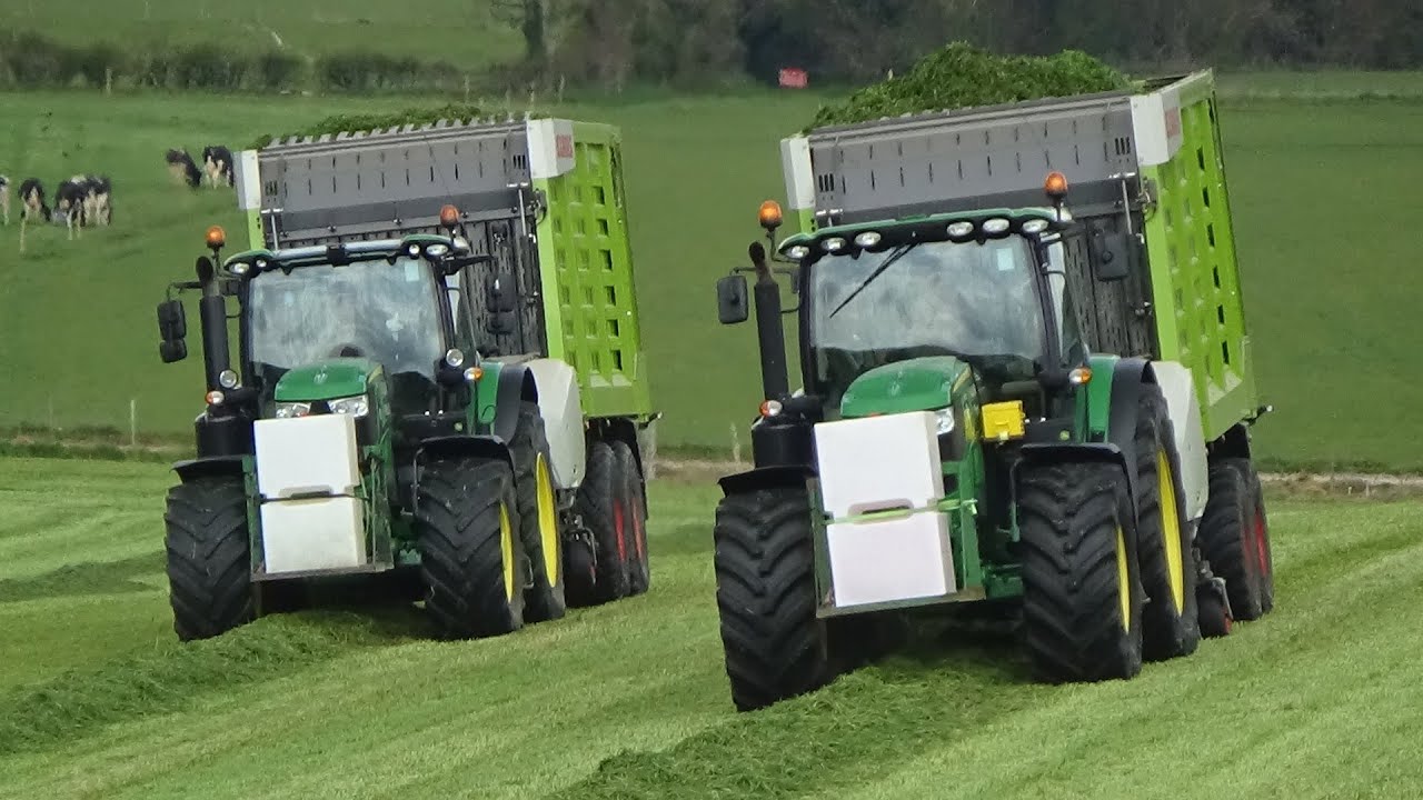 Silage 2021 - Rowing up & Lifting grass with John Deere's and TWO Claas Cargos Wagons!
