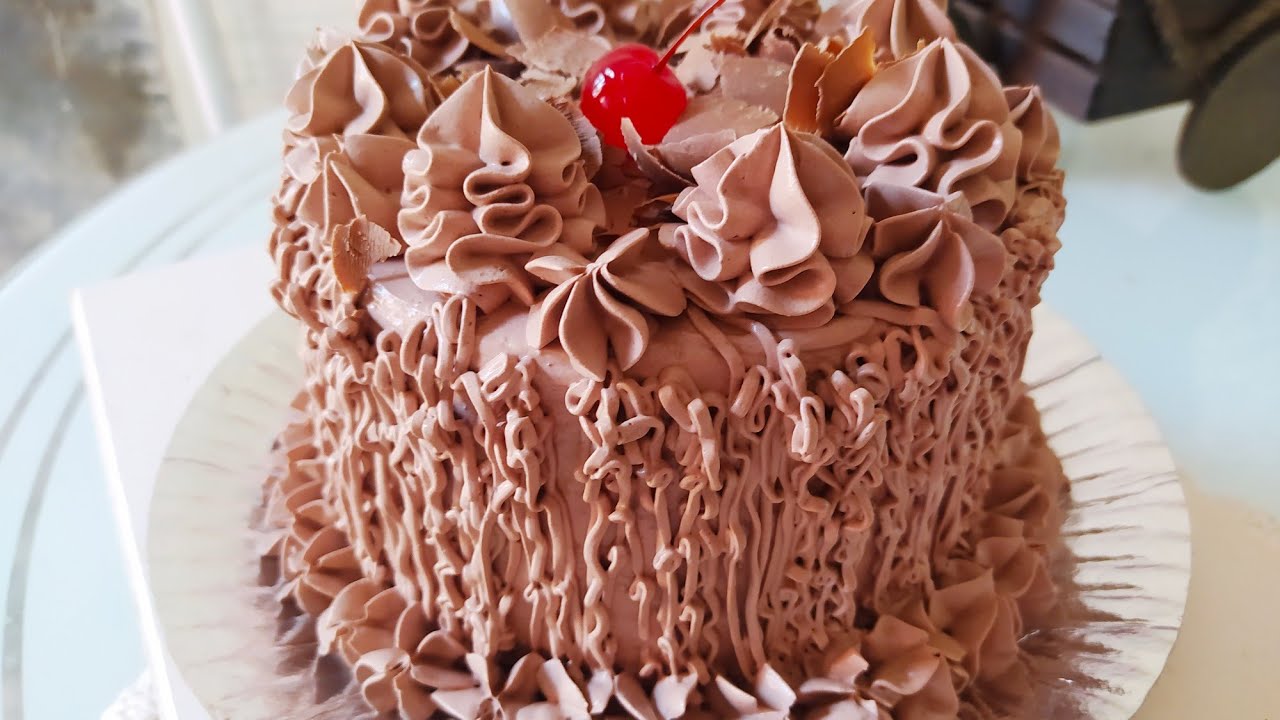 Cobertura e recheio de chocolate que parece de doceria famosa
