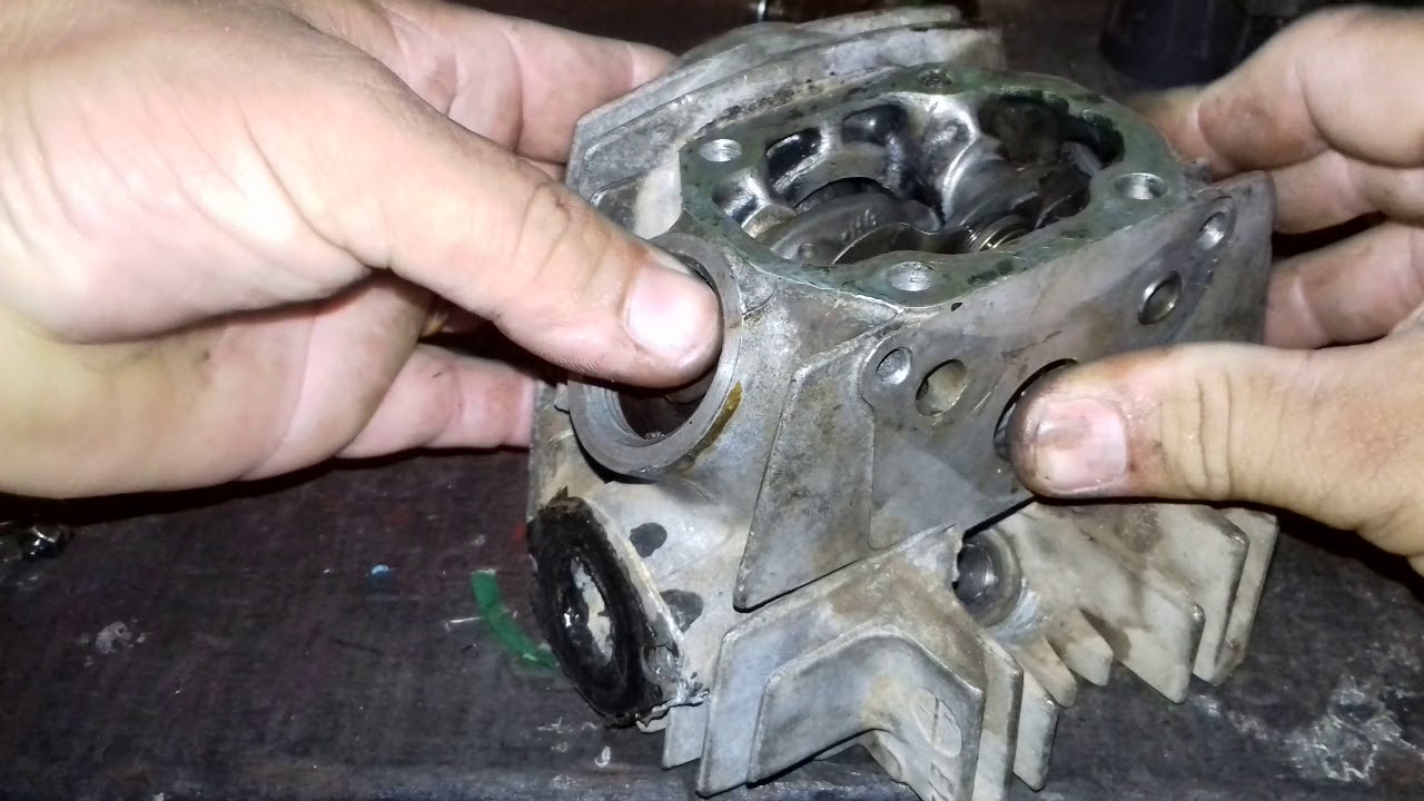 Trocando balanceiro e comando da drim 100cilindrada