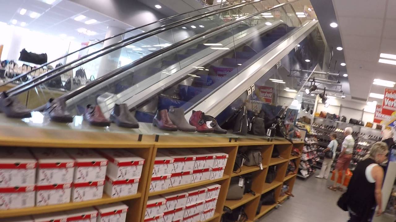 A Transparent OTIS Escalator in a Shoe Store in Dresden, Germany