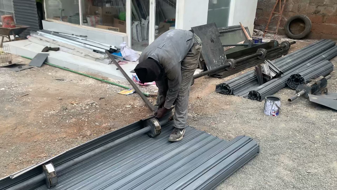 EXTERIOR DESIGNS/INSTALLATION OF ROLLER SHUTTERS GRILL FABRICATED DOORS.