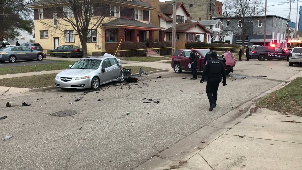 Grand Rapids carjacking, police cruiser struck