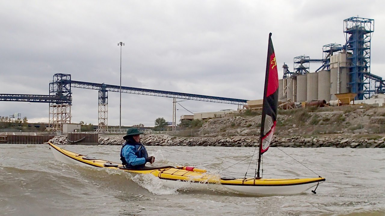 5 kayakers have a great kayak sailing day.