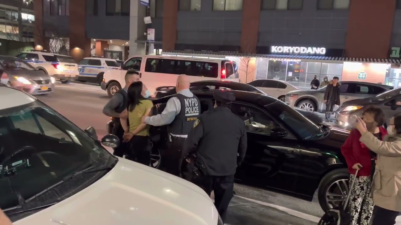 Zhang Xiao Ning walks out of the police station