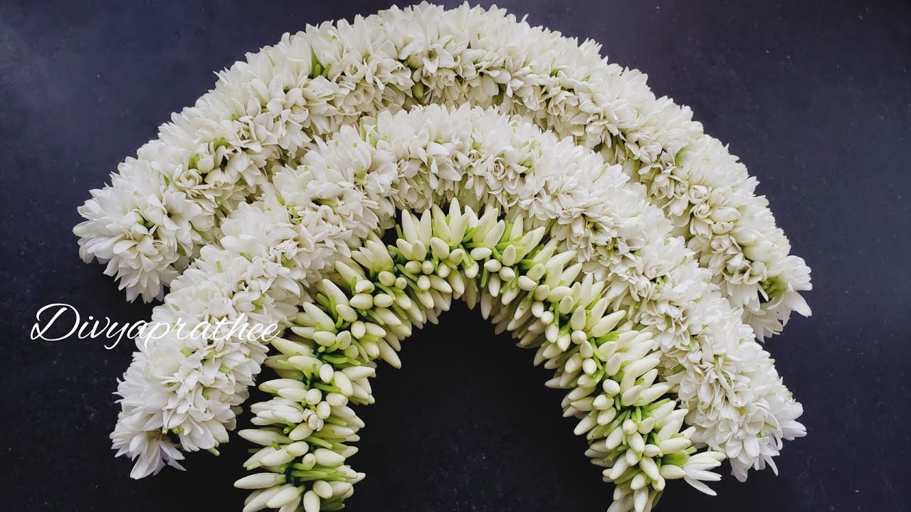 String jasmine flowers closely traditionally with thread/malligai poo malai kattu/DIY flower Garland