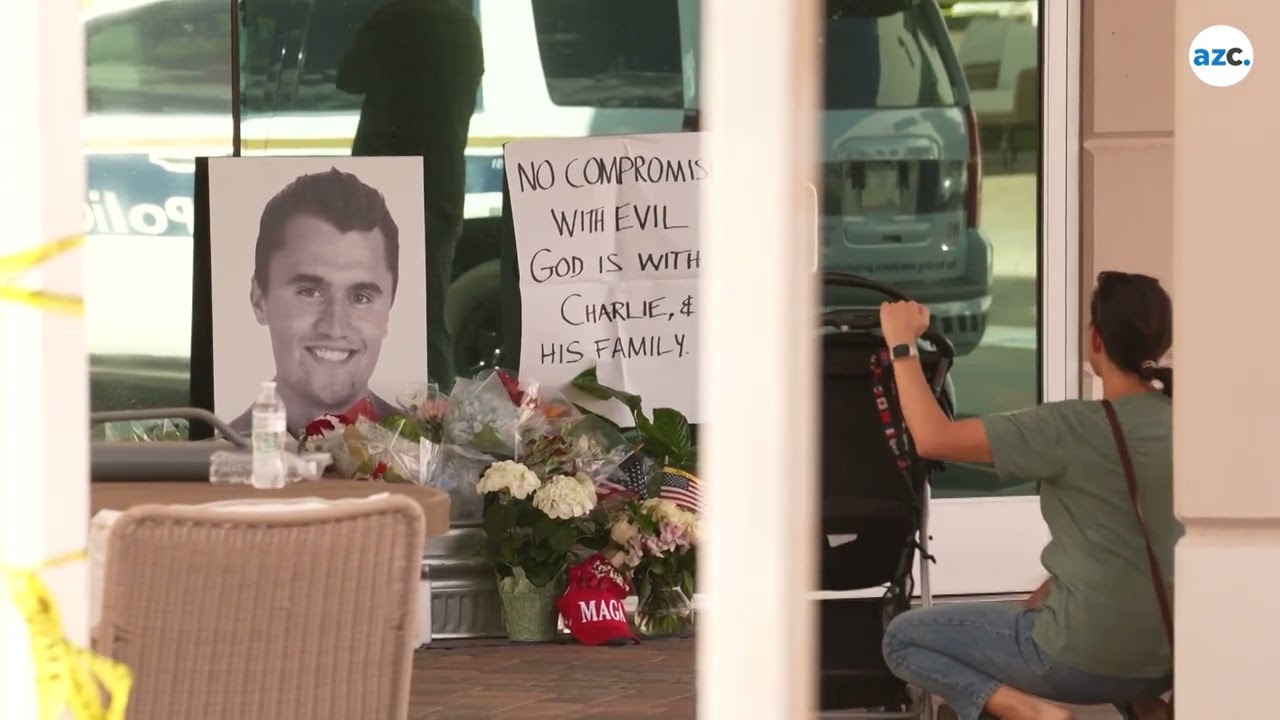 A somber scene outside Charlie Kirk's Turning Point USA HQ in Phoenix