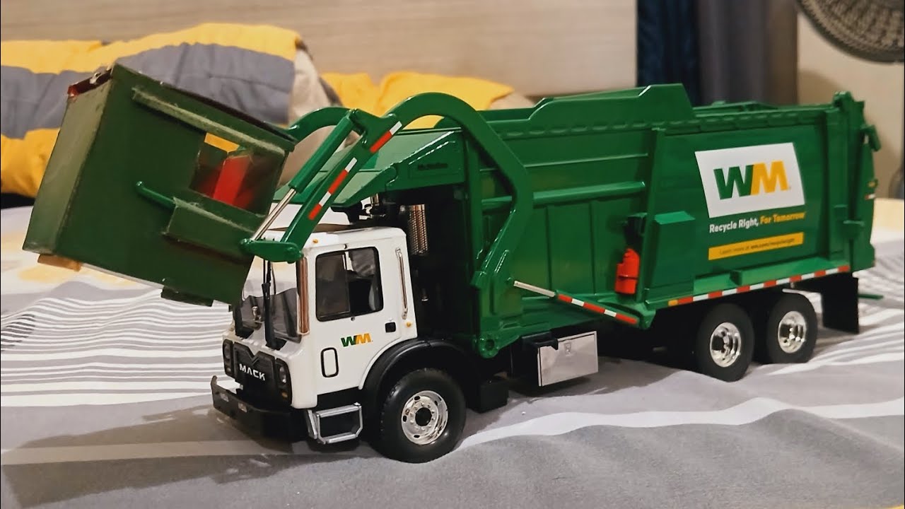 Waste Management First Gear Front Load Action