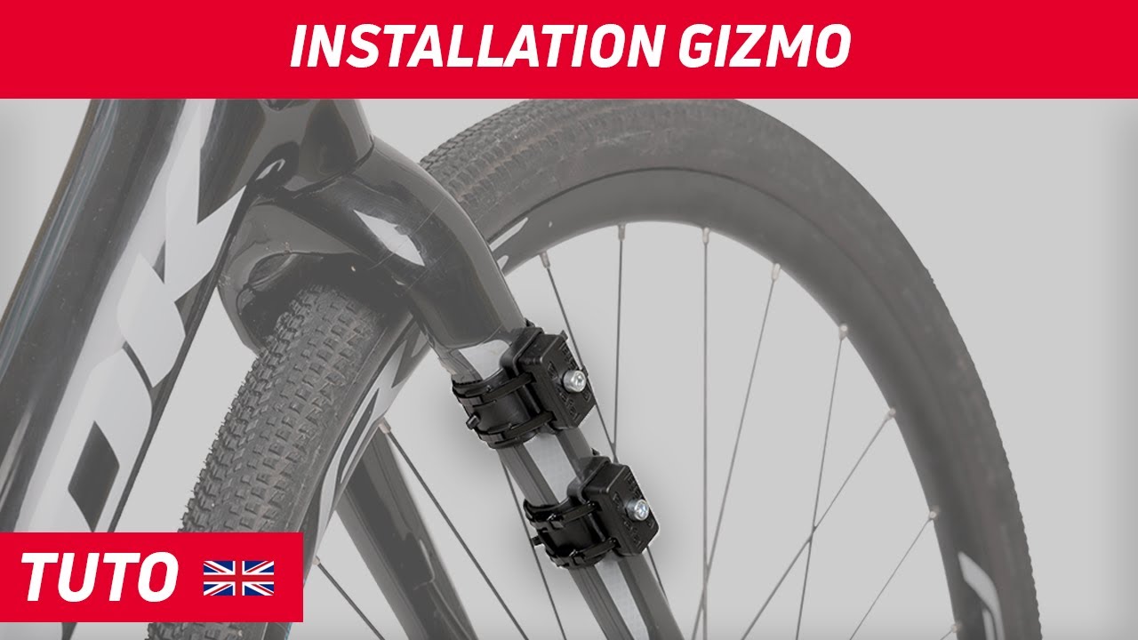 How do I fit the Gizmo universal bottle cage mounting system?