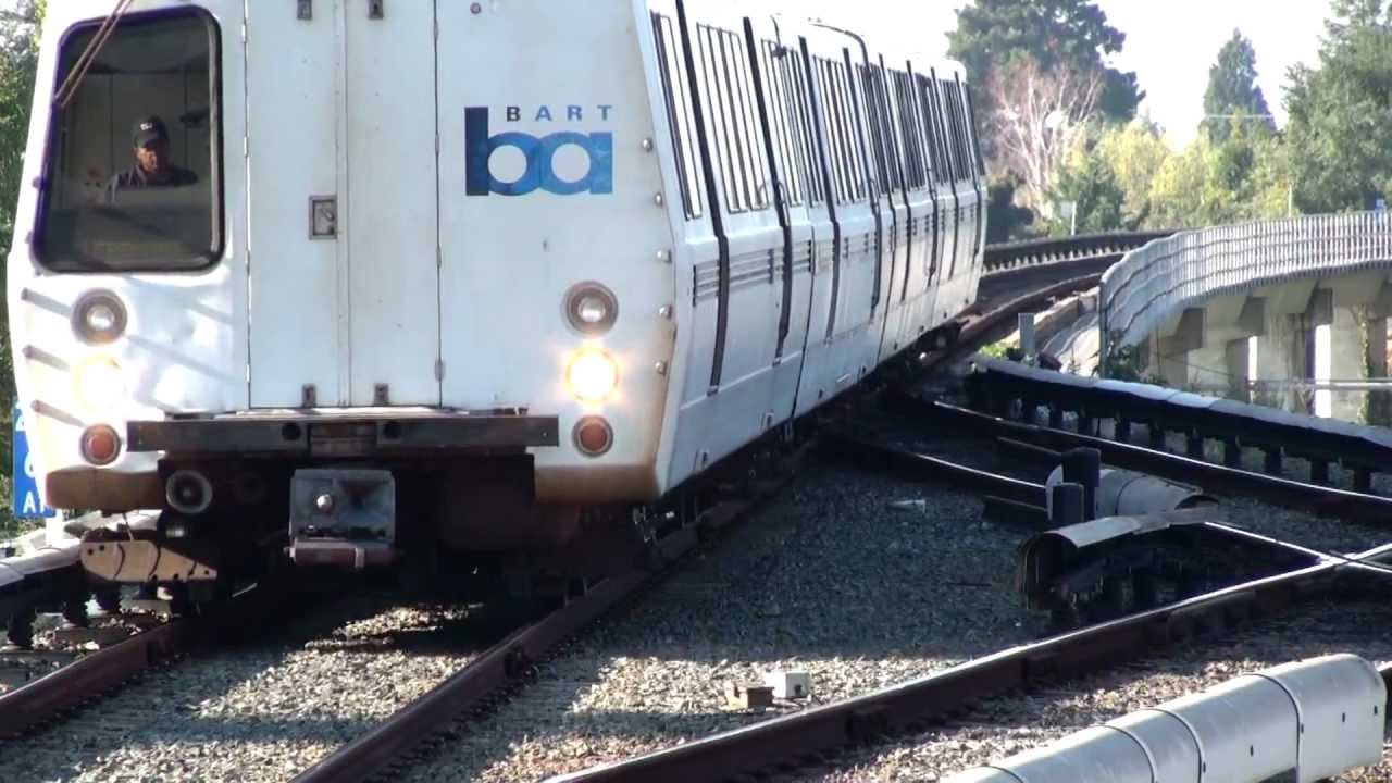 Bart Train buying ticket and boarding Fremont station.