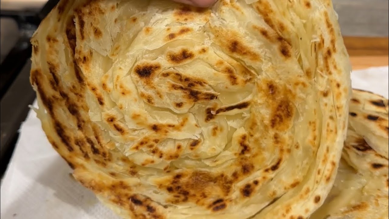 ايدام لحم مع خبز البراتا