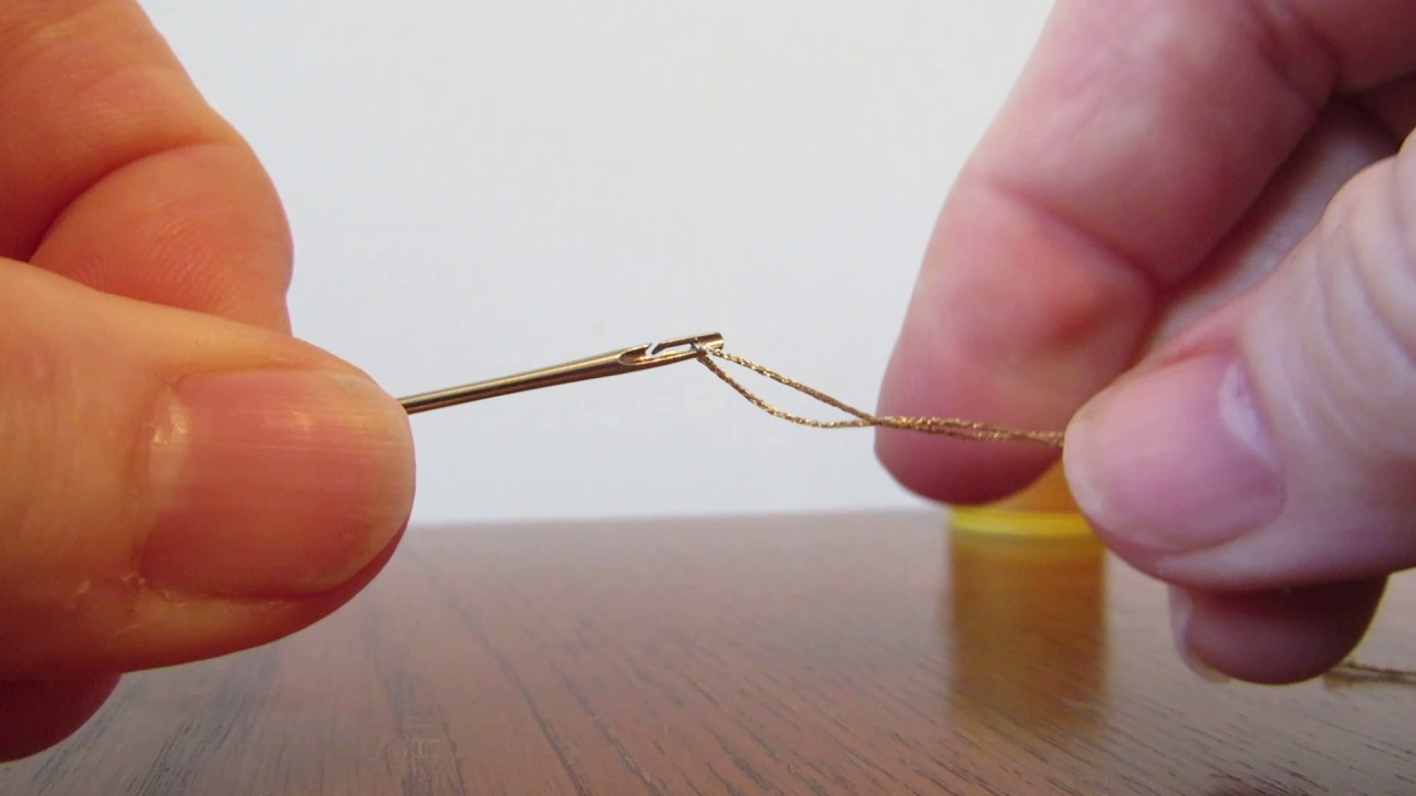 Threading a self threading needle