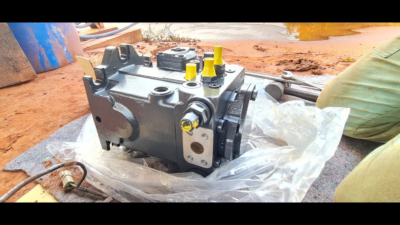 Trocando bomba HST e Bomba Quádrupla da Pá Carregadeira Komatsu WA200 5