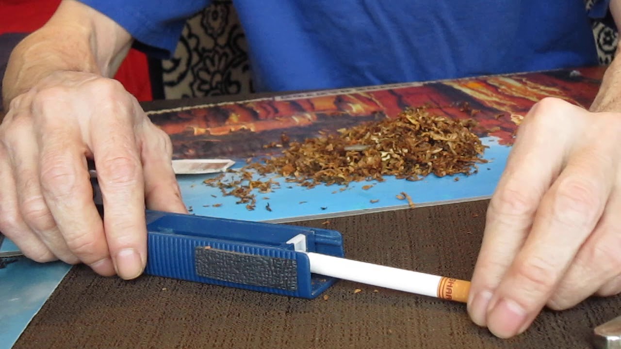 Cigarette rolling machine invention