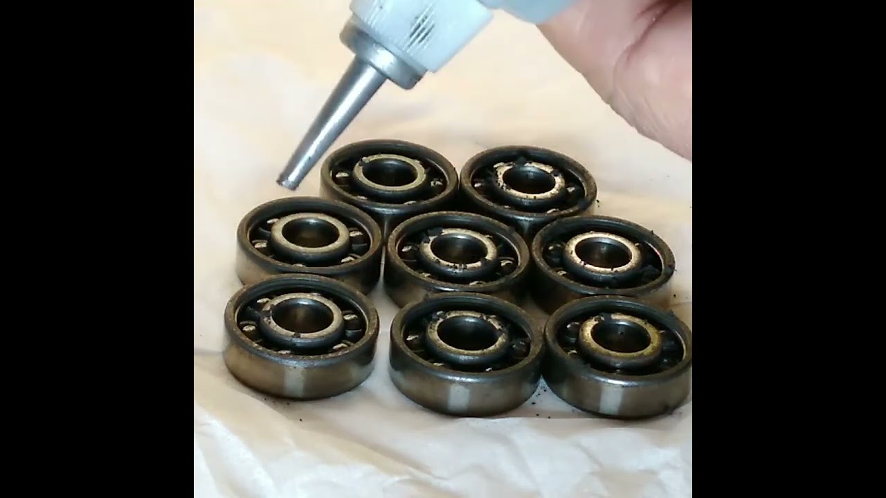 Servicing ceramic bearings using graphite powder.