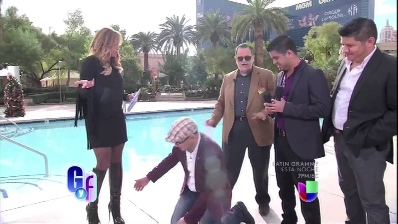 He Kisses Lili Estefan's  Boots