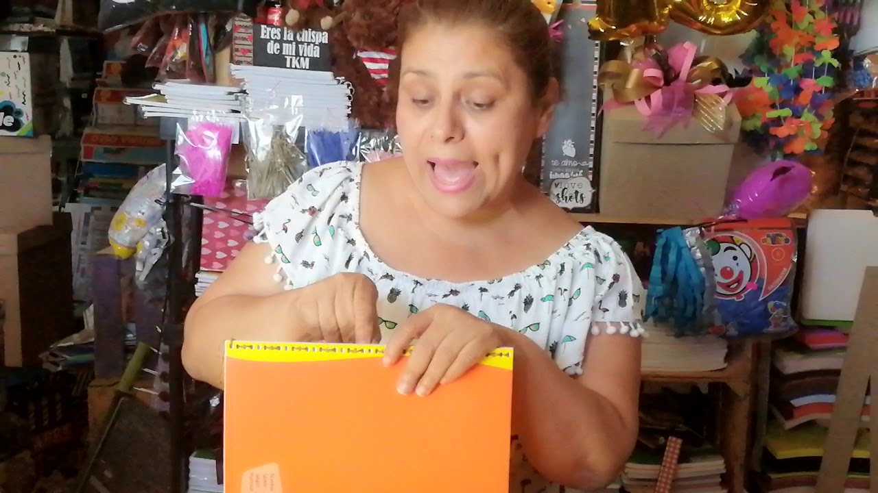 Coser cuaderno de espiral