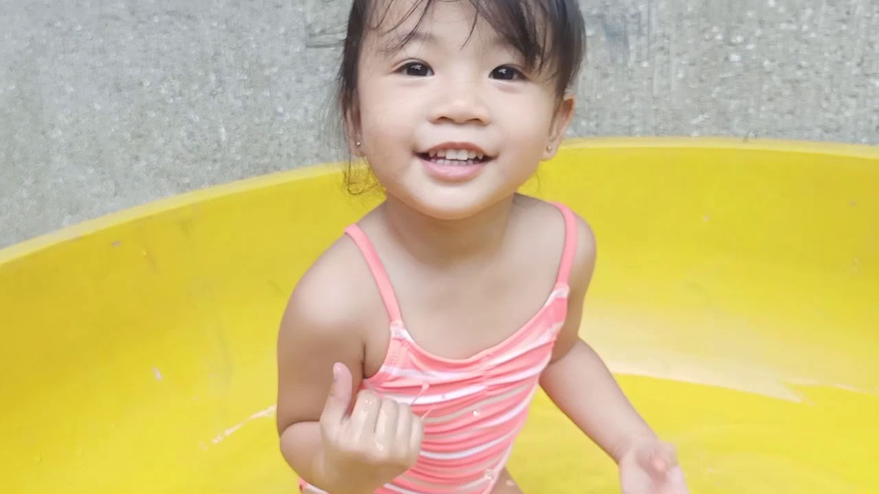 Ramona Swims and Plays in her Yellow Pool