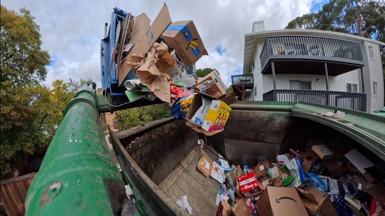 Waste Management front load commercial recycling truck 