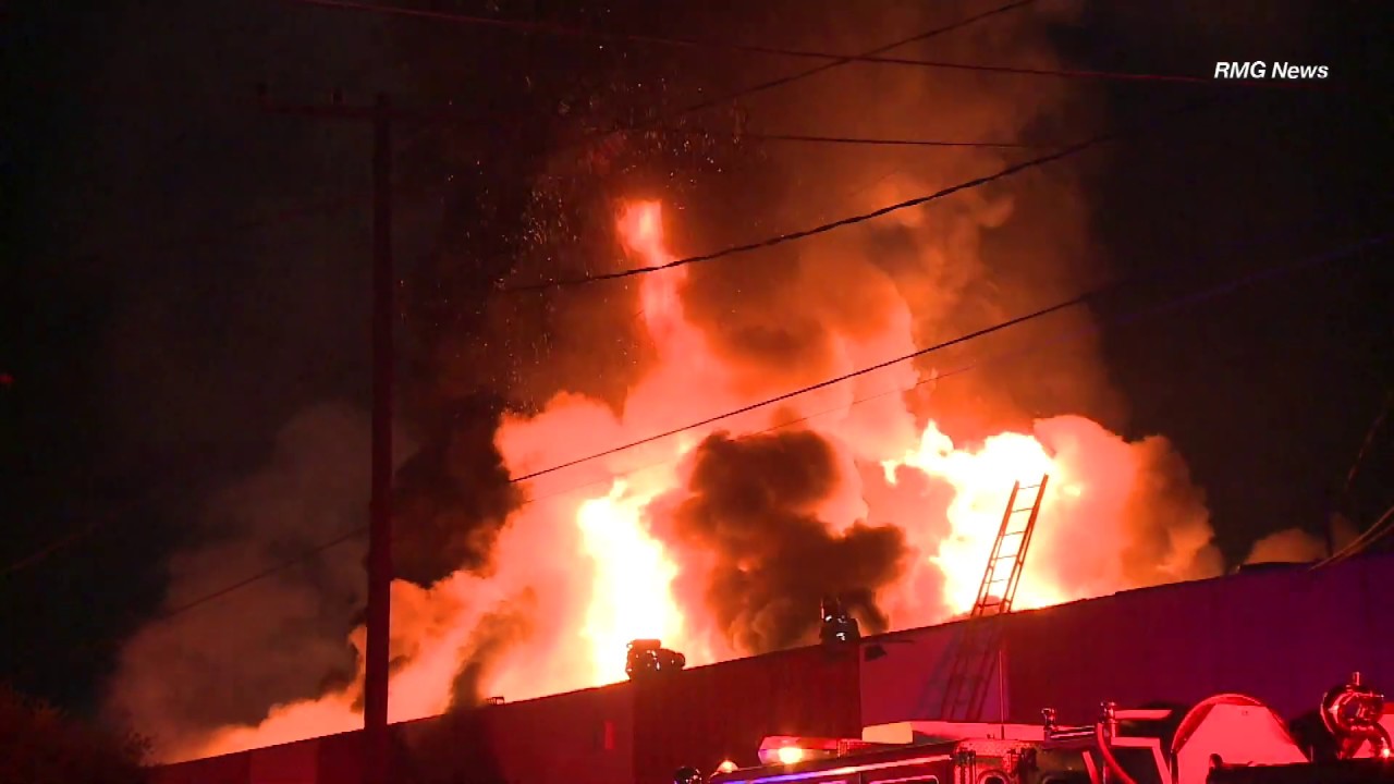 LA County Fire Department tackle a 2 alarm structure fire in Gardena, California