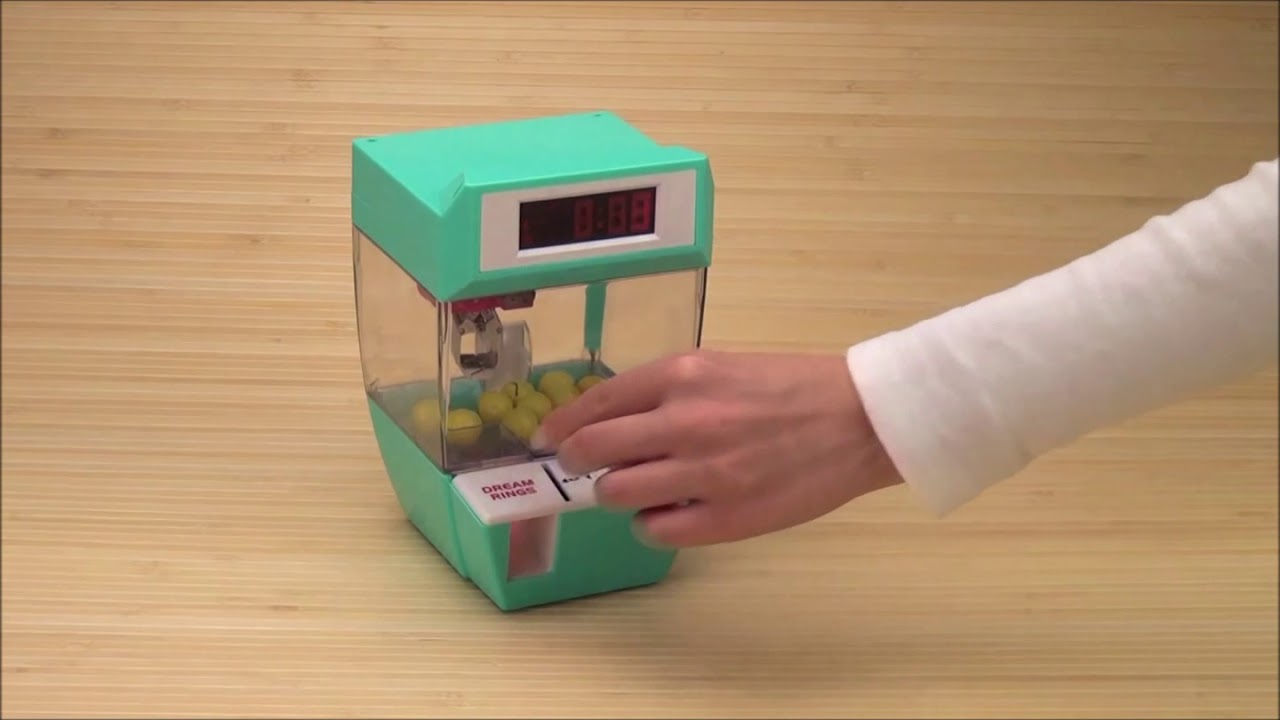 présentations de la machine attrape-bonbon Candy Grabber