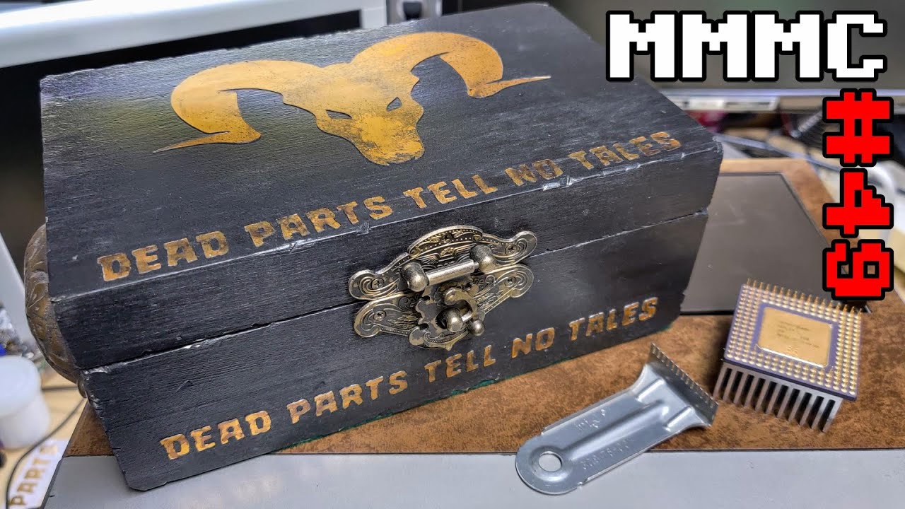 A hand made 'Dead Parts Bin,' an Orinoco Wifi card and a Intel Chip Lifter