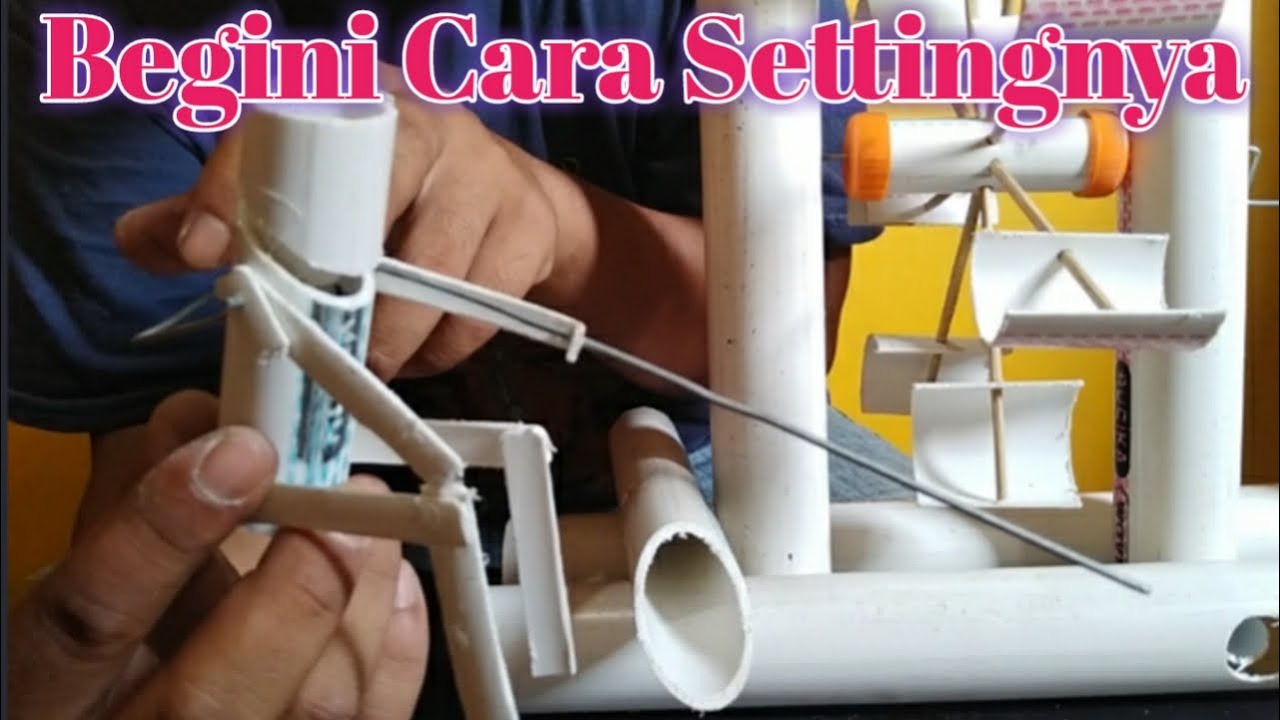 Cara membuat orang orangan memancing pada kincir air