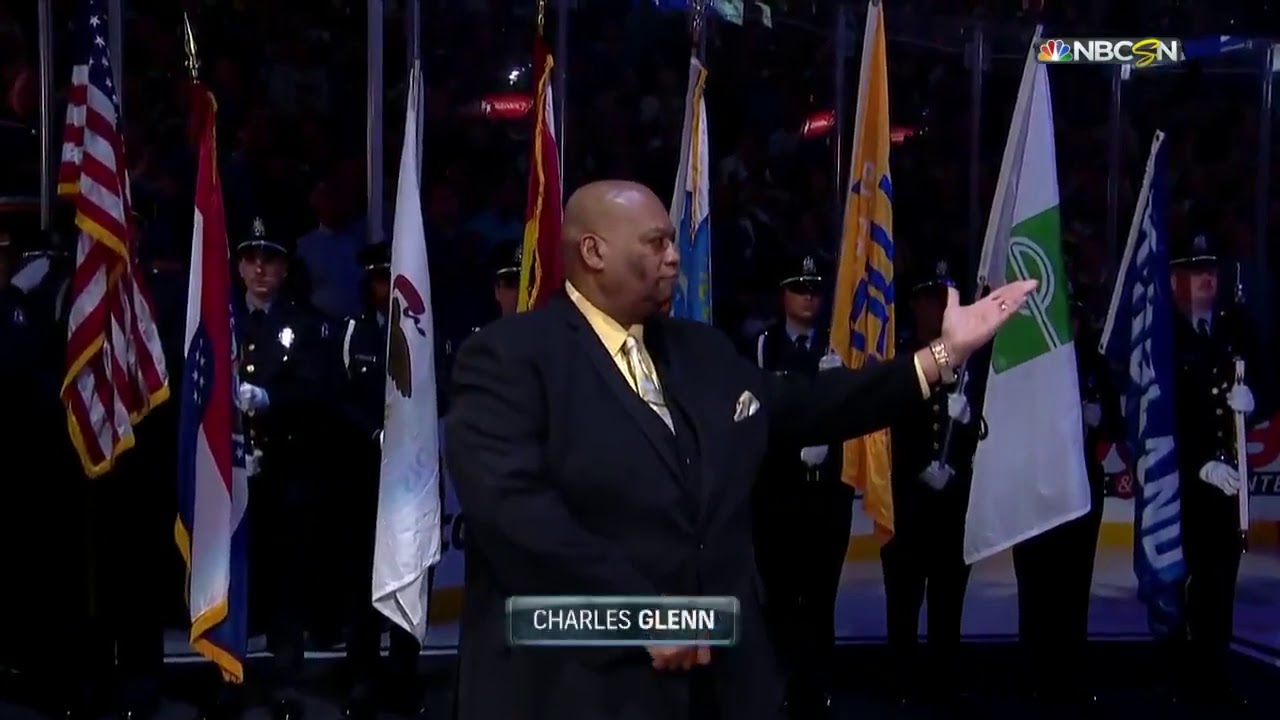 Charles Glenn performing the national anthem