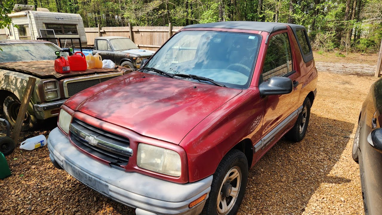 Замена водяного насоса Chevrolet Tracker 2.0L 2000 года