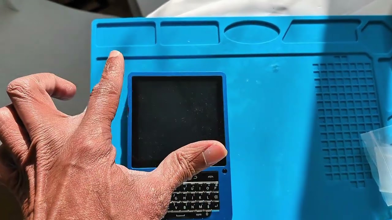 Hackberrypi CM5 lite handheld..4 inch hyper pixel screen and blackberry style keyboard.