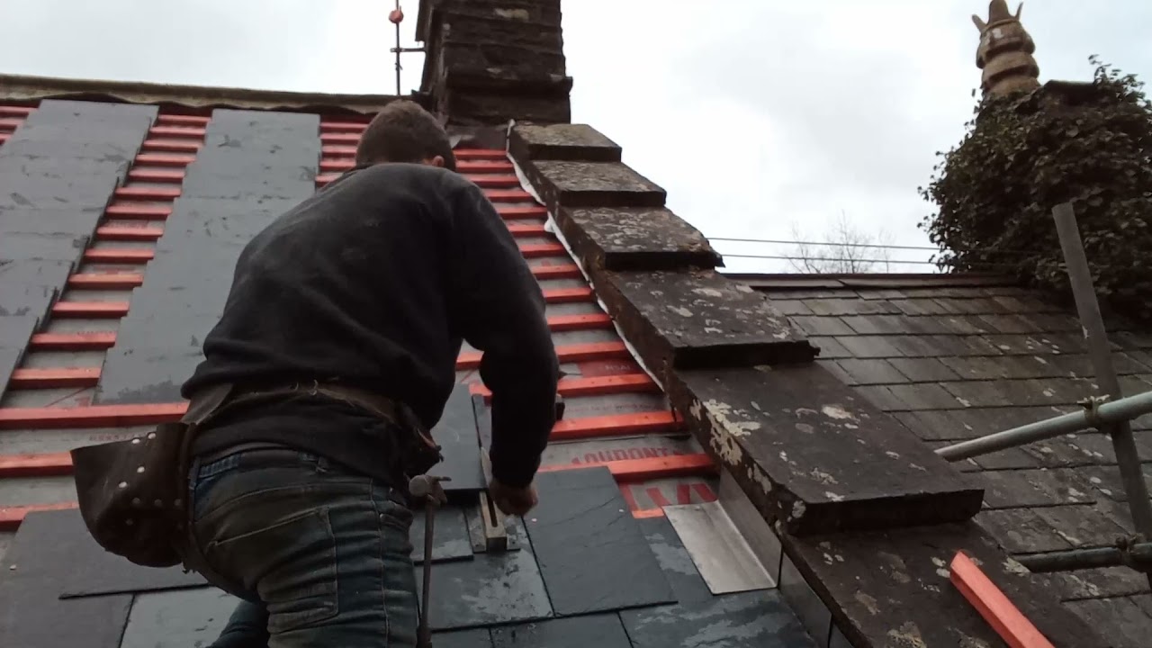 How to fit Lead soakers and cut slates against walls/chimneys