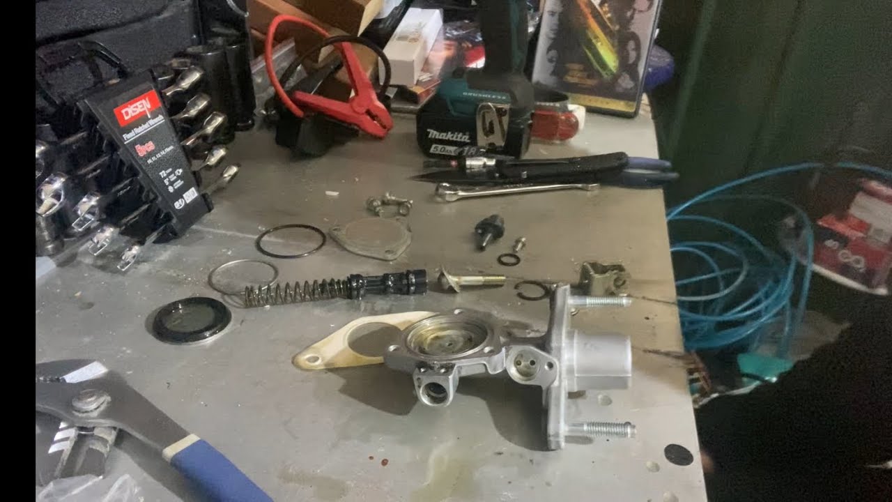 Disassembling the master cylinder!