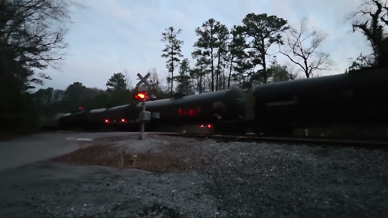  NS 4893 & 7675 clear mile post 22 with a long, southbound manifest 