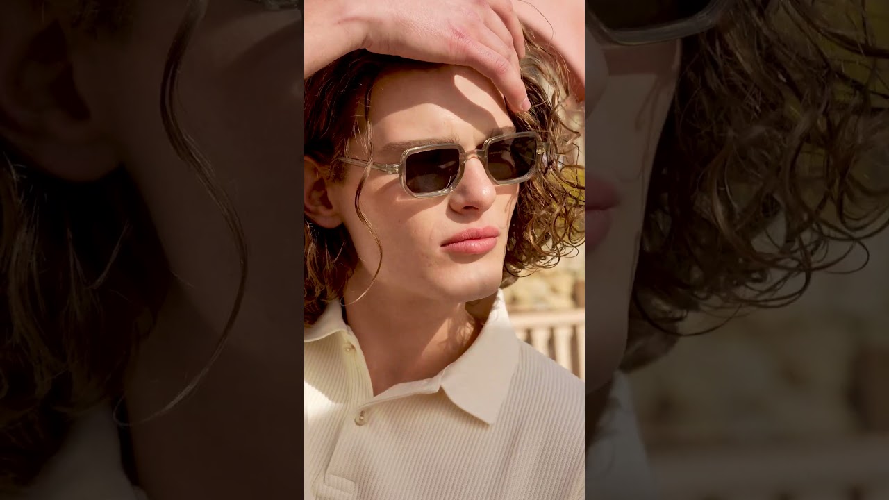 New square glasses with gradient details on the temples.