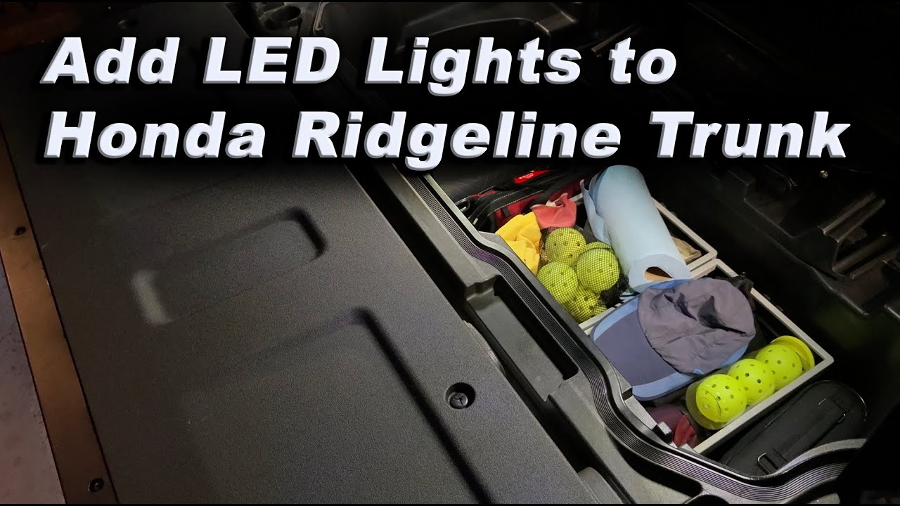 Светодиодные фонари с жестким подключением в багажнике Honda Ridgeline.