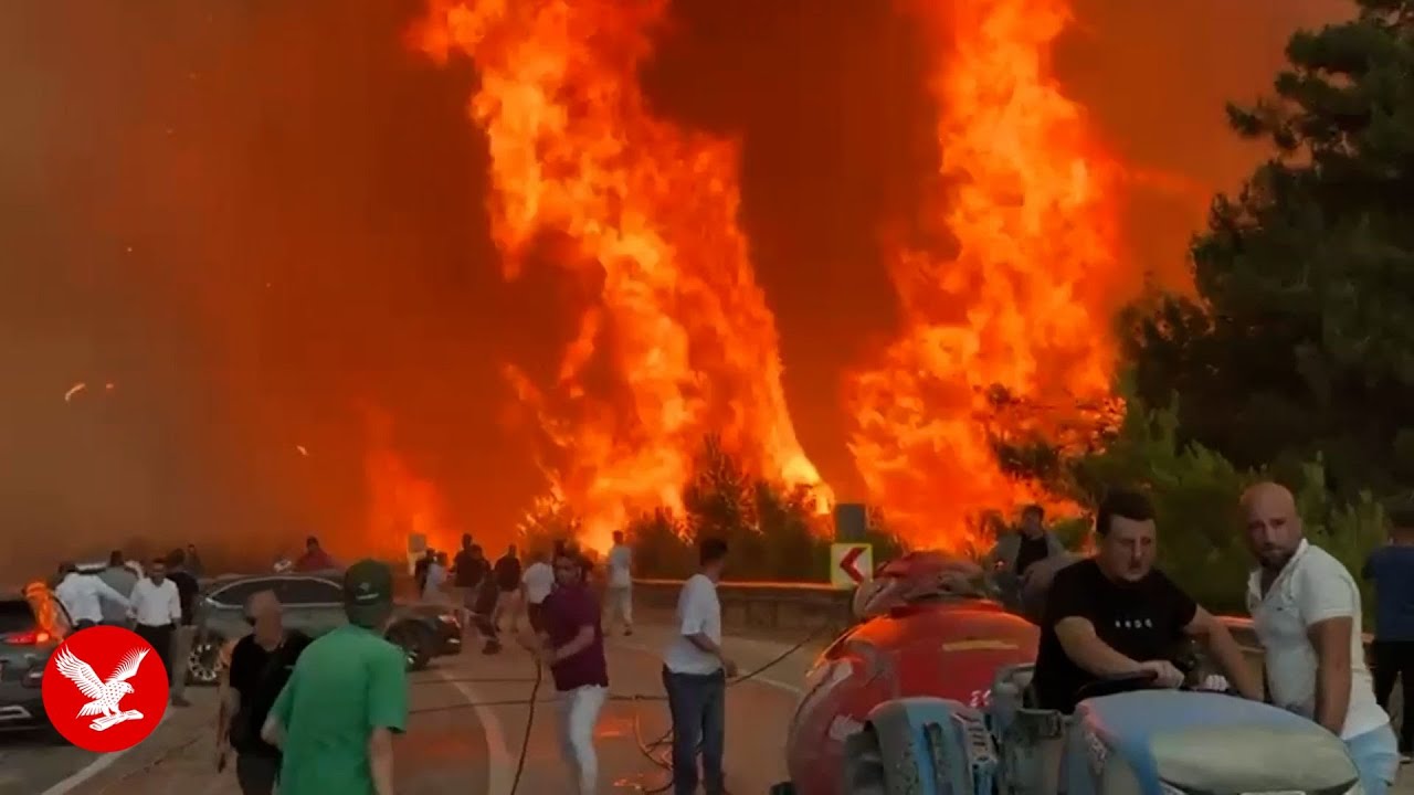 Raging wildfires engulf popular Turkey holiday destination as locals battle flames